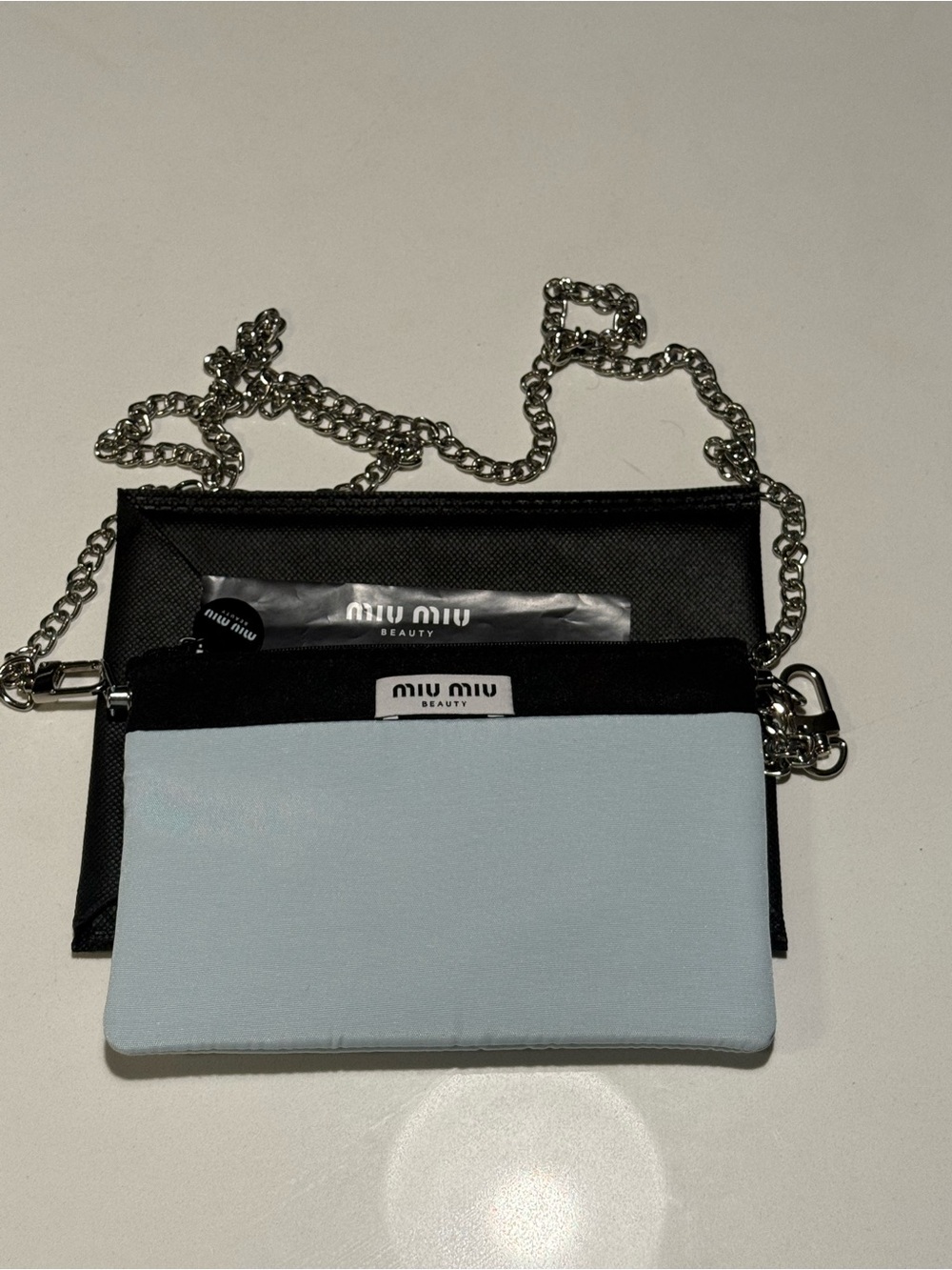 Miu Miu Black and Light Blue Chain Crossbody Pouch
